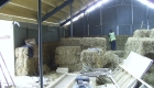 Image illustrating straw bale walls under construction 