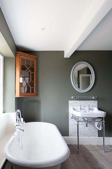 Image of bathroom design with freestanding bath and sink