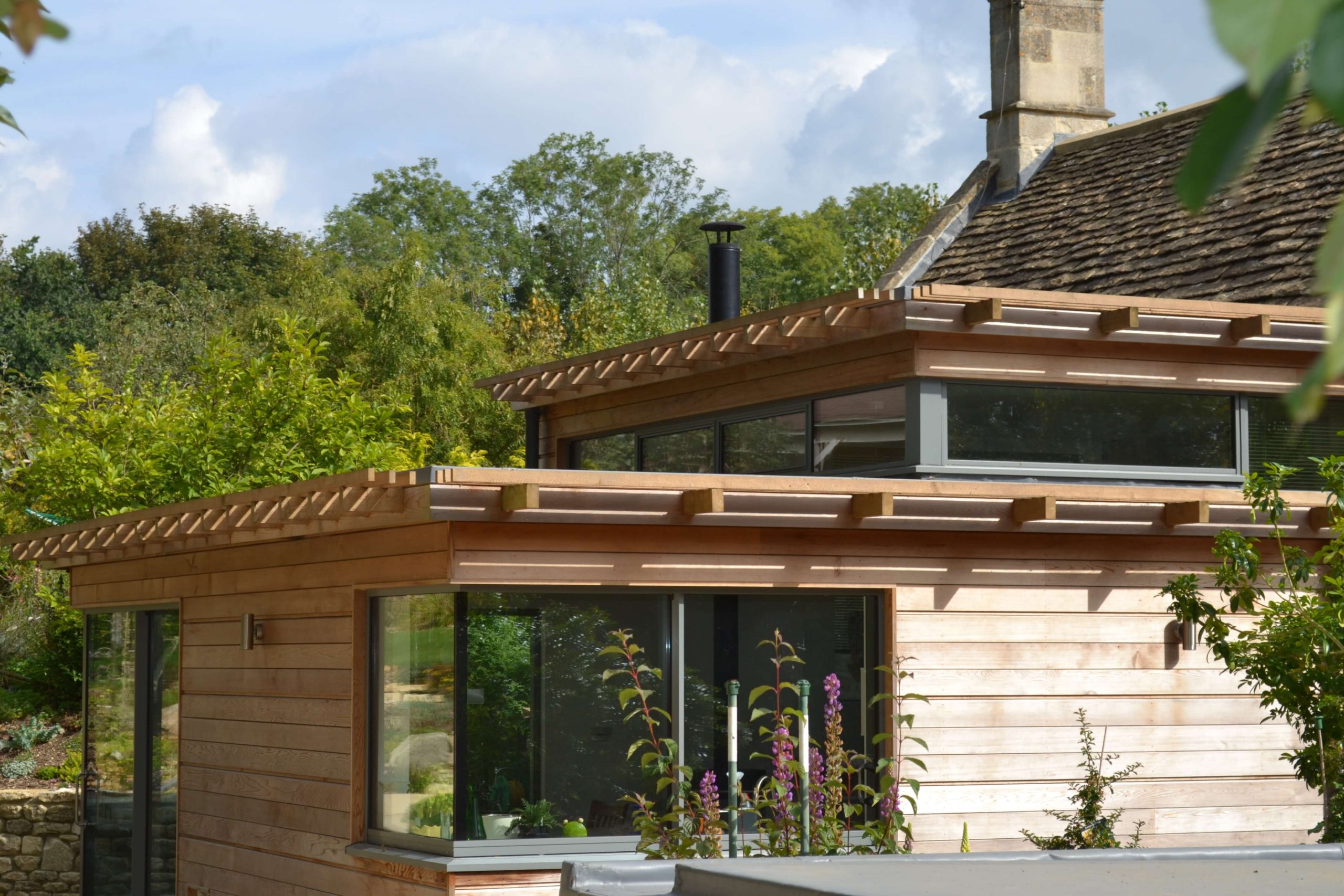 elegant timber clad extension to historic building