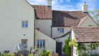 rear view of listed building  project with new external wall insulation and complex roofs