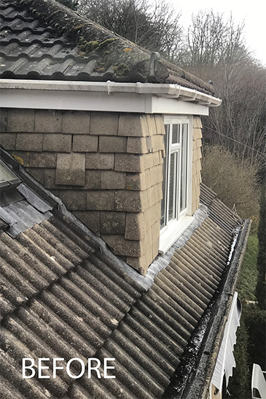 1960s house ugly tiled dormer window with UPVC gutter and facia